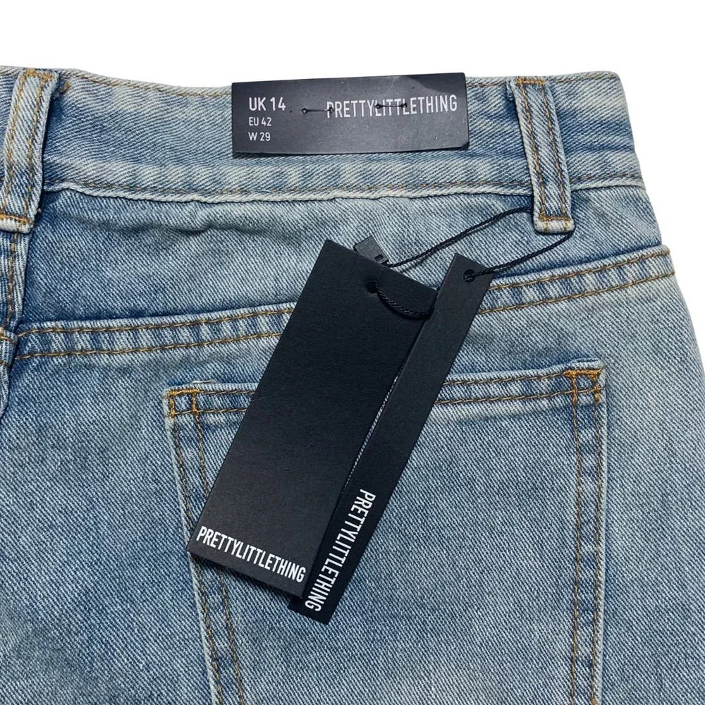 PrettyLittleThing | Women | Light Wash Extreme Distressed Mom Jeans | Size 29